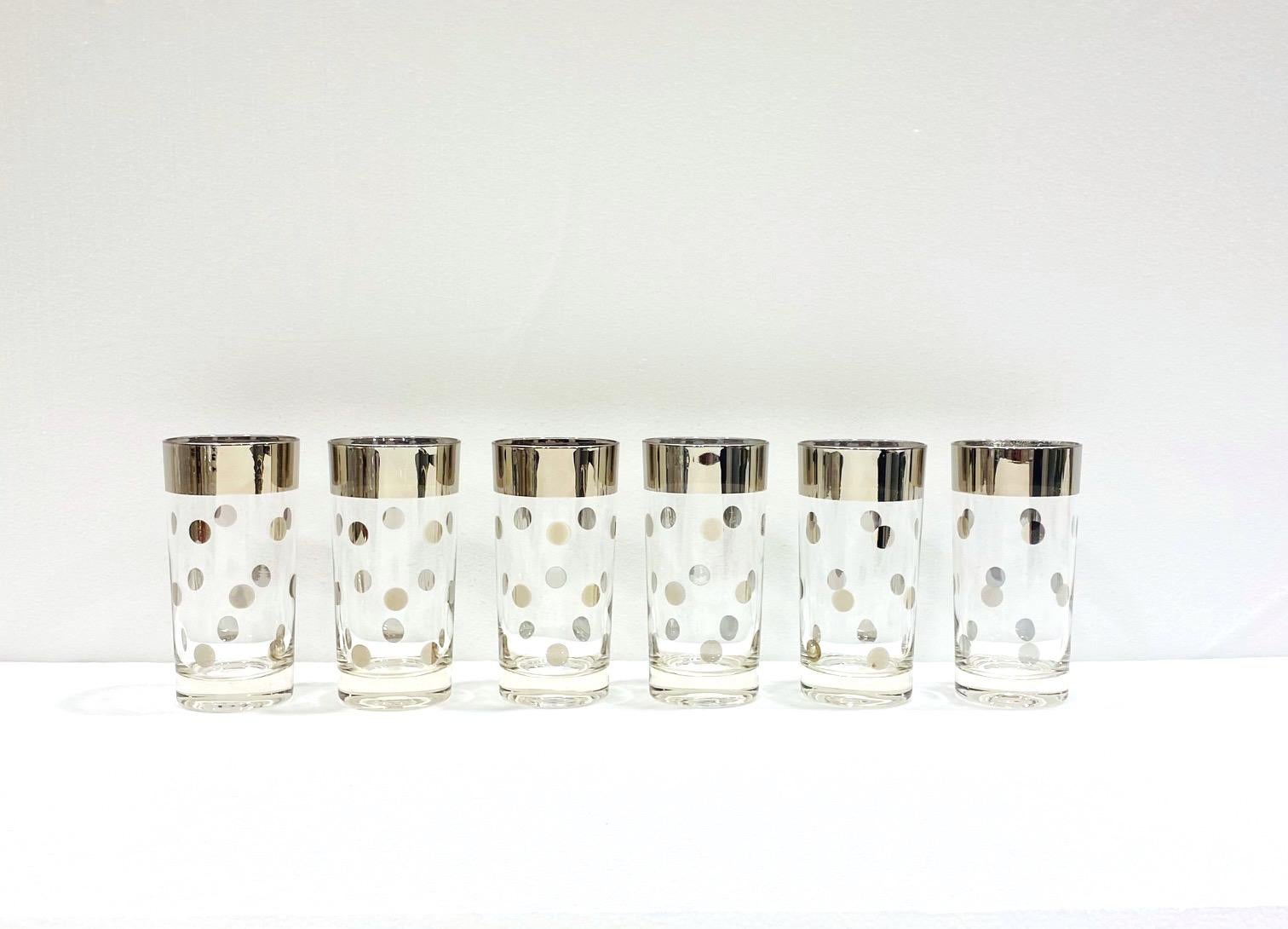 Set of six vintage highball or Tom Collins cocktail glasses from the iconic Mid-Century Modern designer, Dorothy Thorpe. Barware glasses feature sleek cylinder forms with silver polka dots and silver overlay rims, for which Thorpe is recognized and