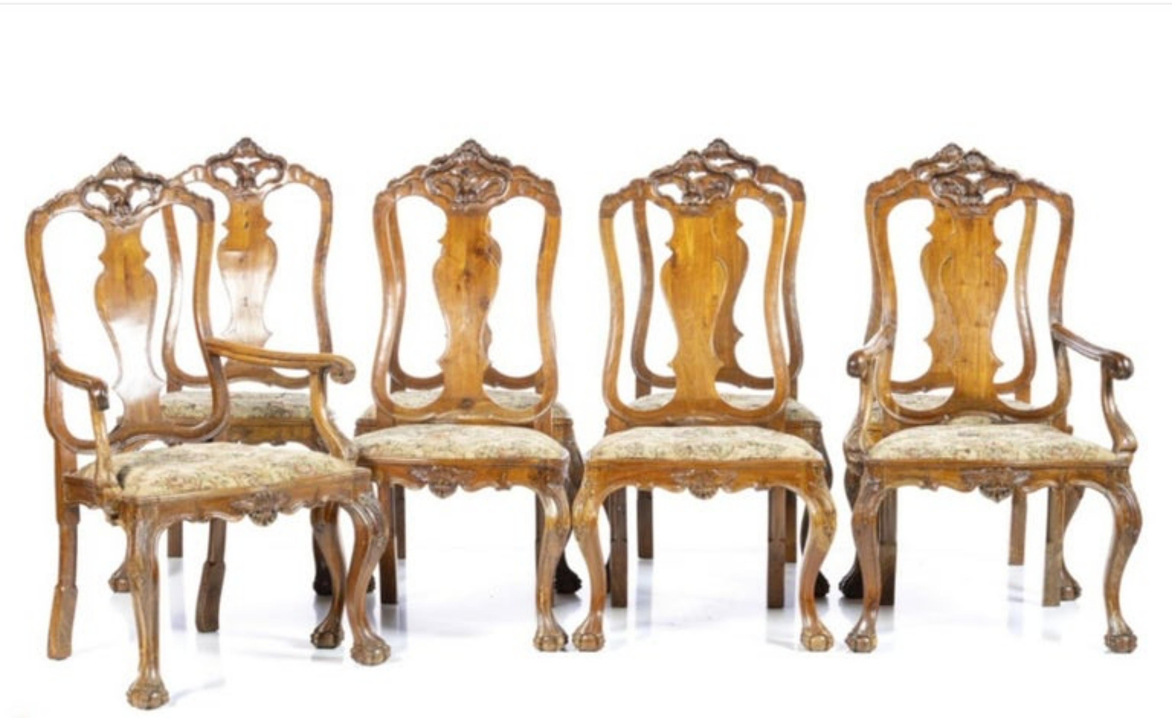 SET OF SIX CHAIRS AND TWO CHAIRS

Portuguese D. João V, 18th Century
in carved walnut wood.
Upholstered seats.
Dim.: (chair) 110 x 64 x 49 cm
good conditions.
