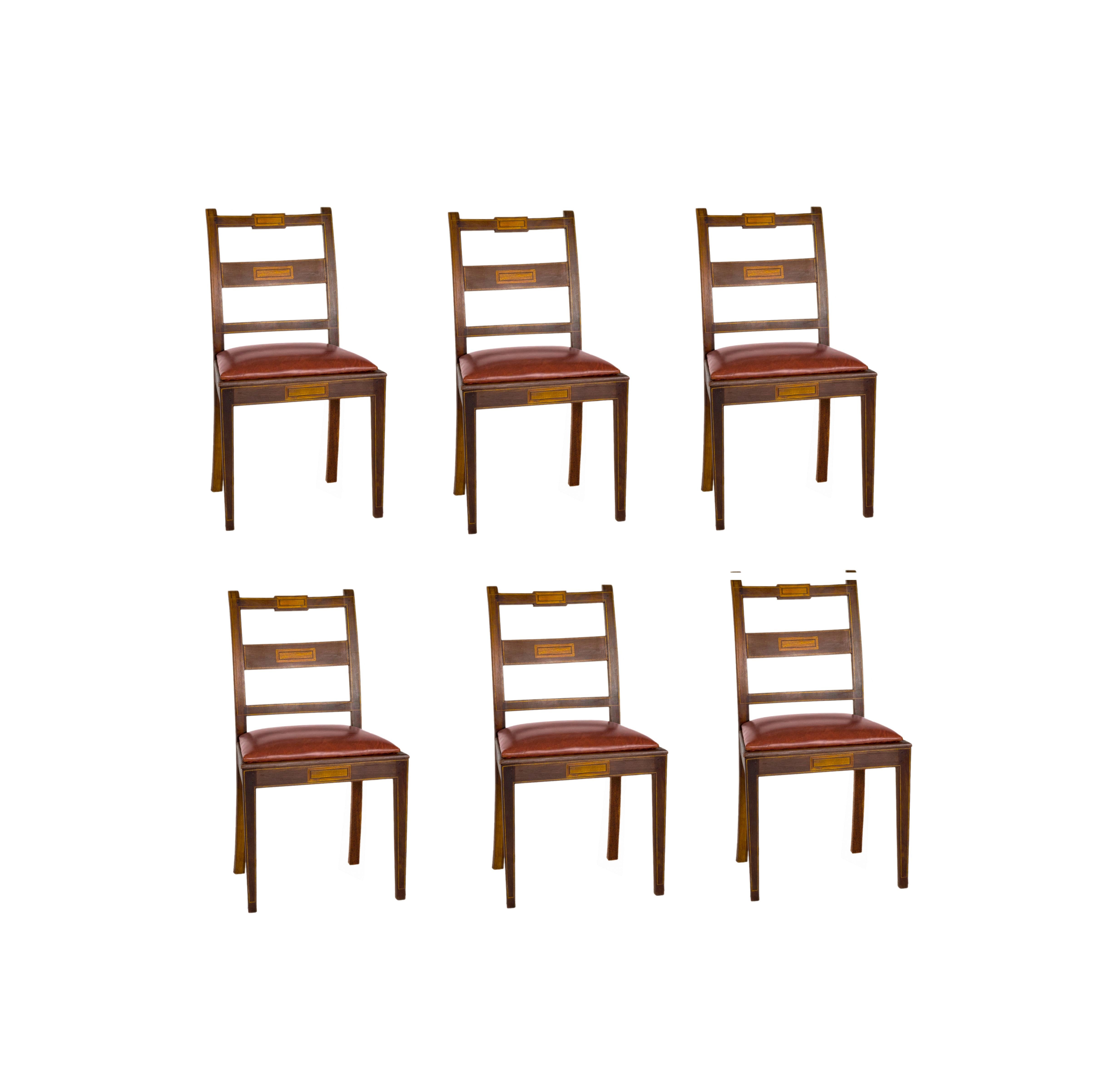 Meticulously maintained solid rosewood dining chair set with natural straw upholstery and soft leather upper, double layer system, linear marquetry.
Classic Portuguese style set of six chairs, refinished by a carpenter, in great condition.