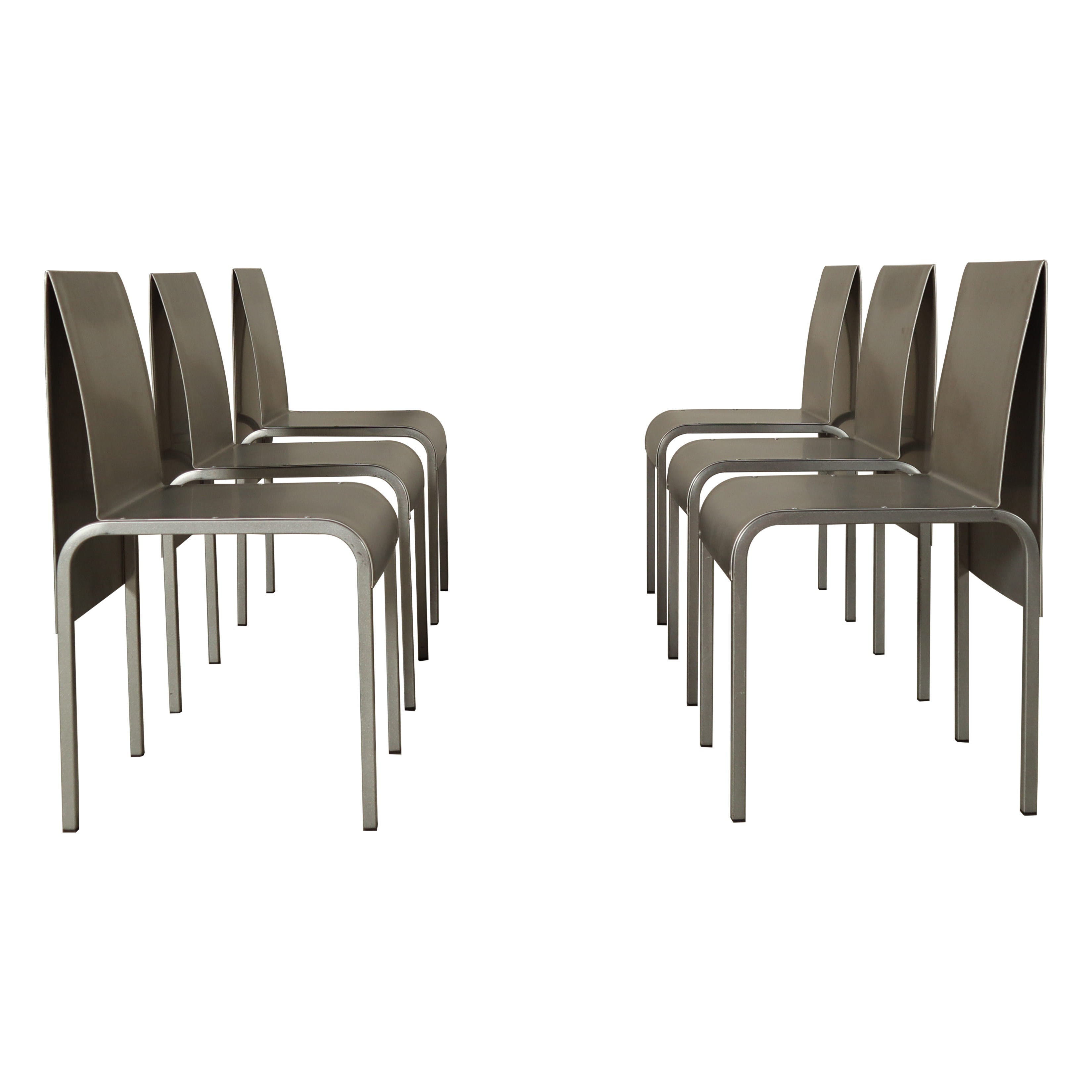 Set of six postmodernist stainless steel dining chairs from circa 1980-1990.