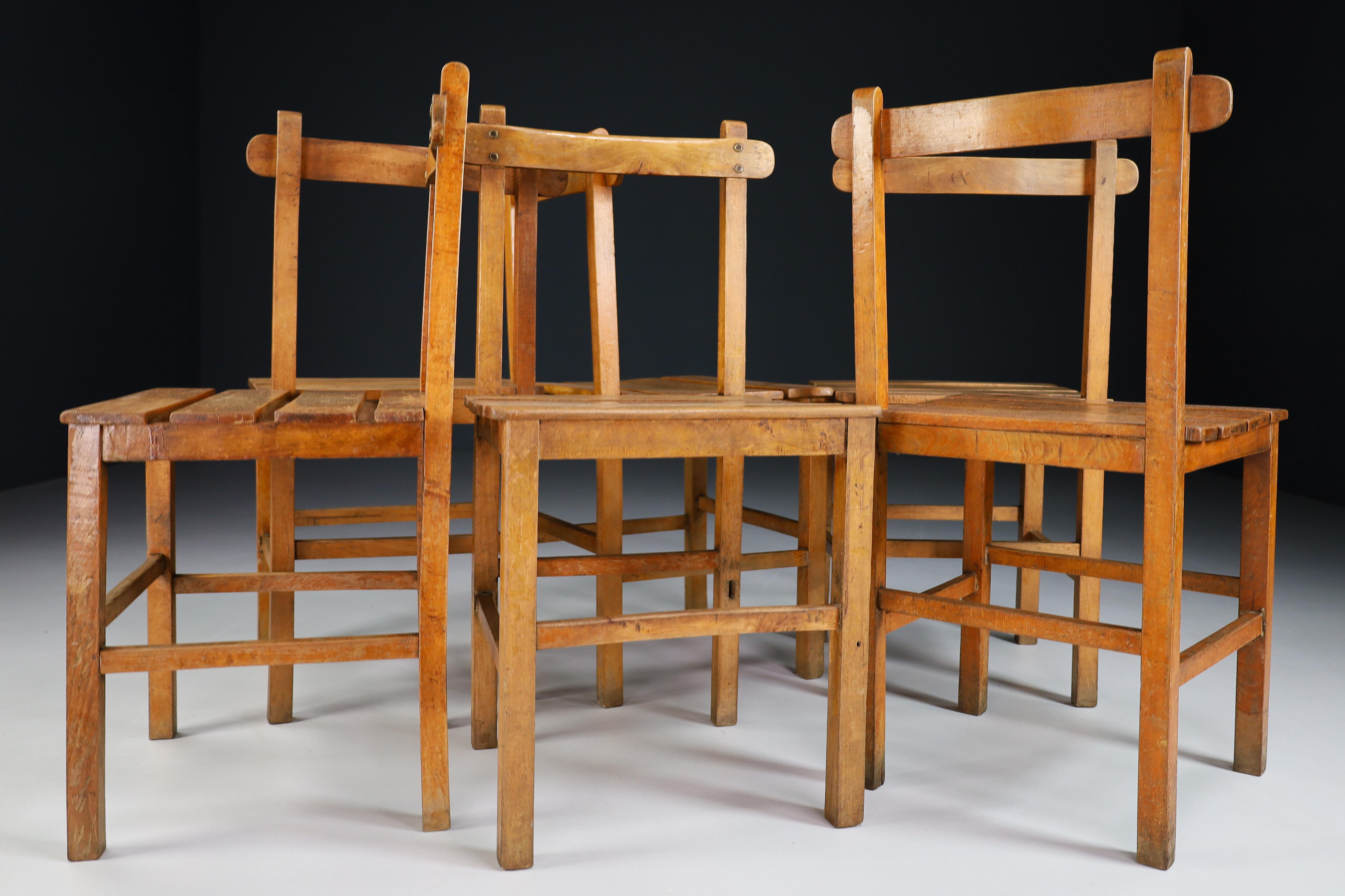 French Set of Six Primitive Chairs in Patinated Beechwood, France 1950s