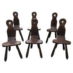 Set of six primitive chairs in solid oak