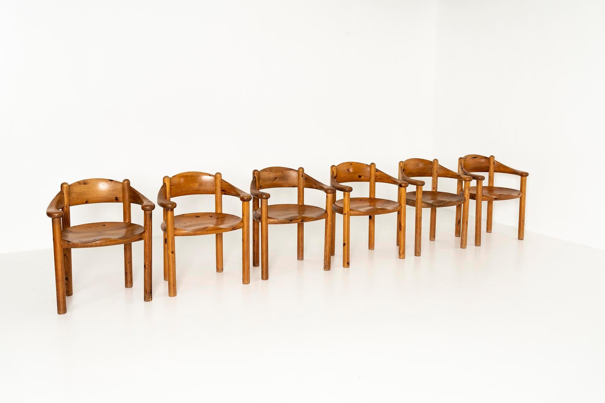 Great set of six Danish armchairs by Rainer Daumiller for Hirtshals Sawmill from the 1970s. Despite their solid look due to the material, the curved backrests that smoothly transition into the armrests, give the chairs a soft touch. They are made of