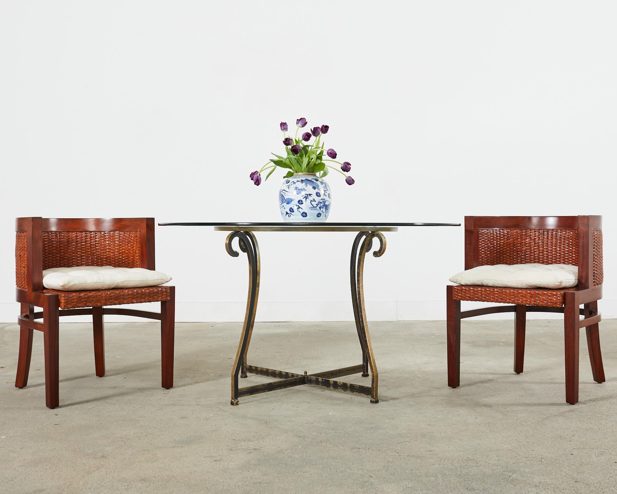 Rare set of six barrel back form dining chairs or armchairs made in the British colonial style by Ralph Lauren Home. Known as Modern Sands collection chairs they feature a mahogany frame with a round back inset with woven rattan on the seat and