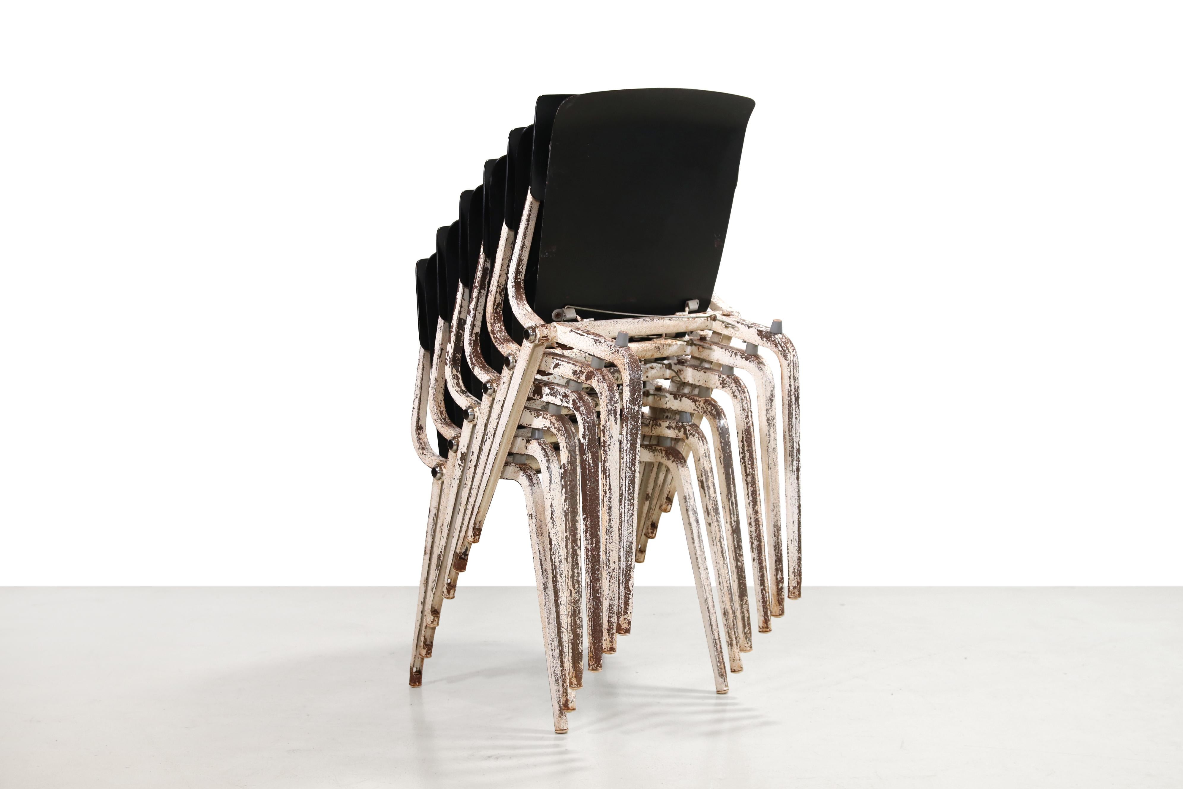 A stunning set of folding and stackable Revolt chairs by Friso Kramer for Ahrend de Cirkel. This exceptionally rare set was designed in 1953 and produced for only four years. The design received the Signe d'Or award in 1958, a prestigious design