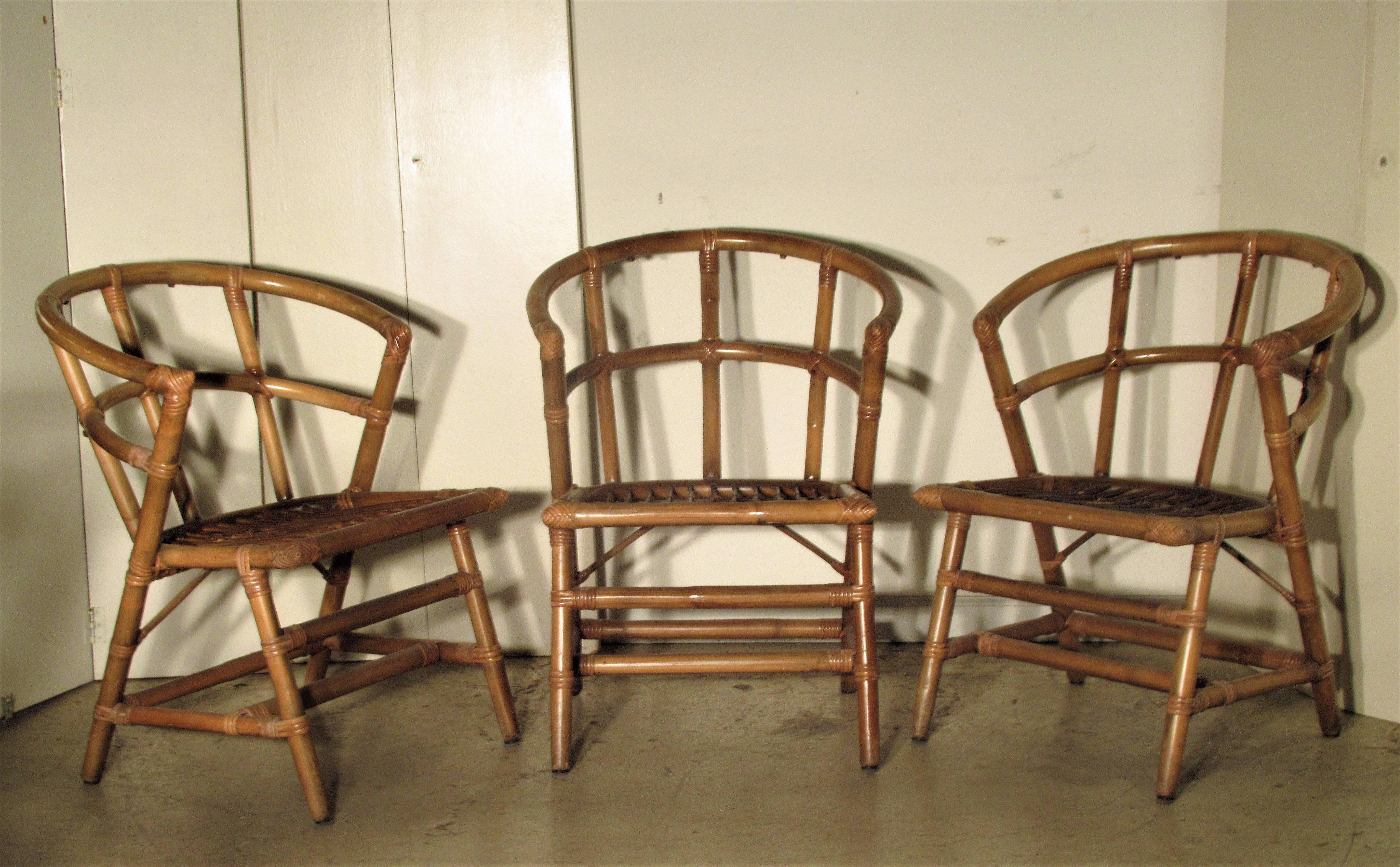 A hard to find set of six matching natural rattan side or dining chairs by Willow and Reed often attributed to Tommi Parzinger. All chairs in great glowing original rich honey colored surface/structurally solid strong/no breaks or losses, circa