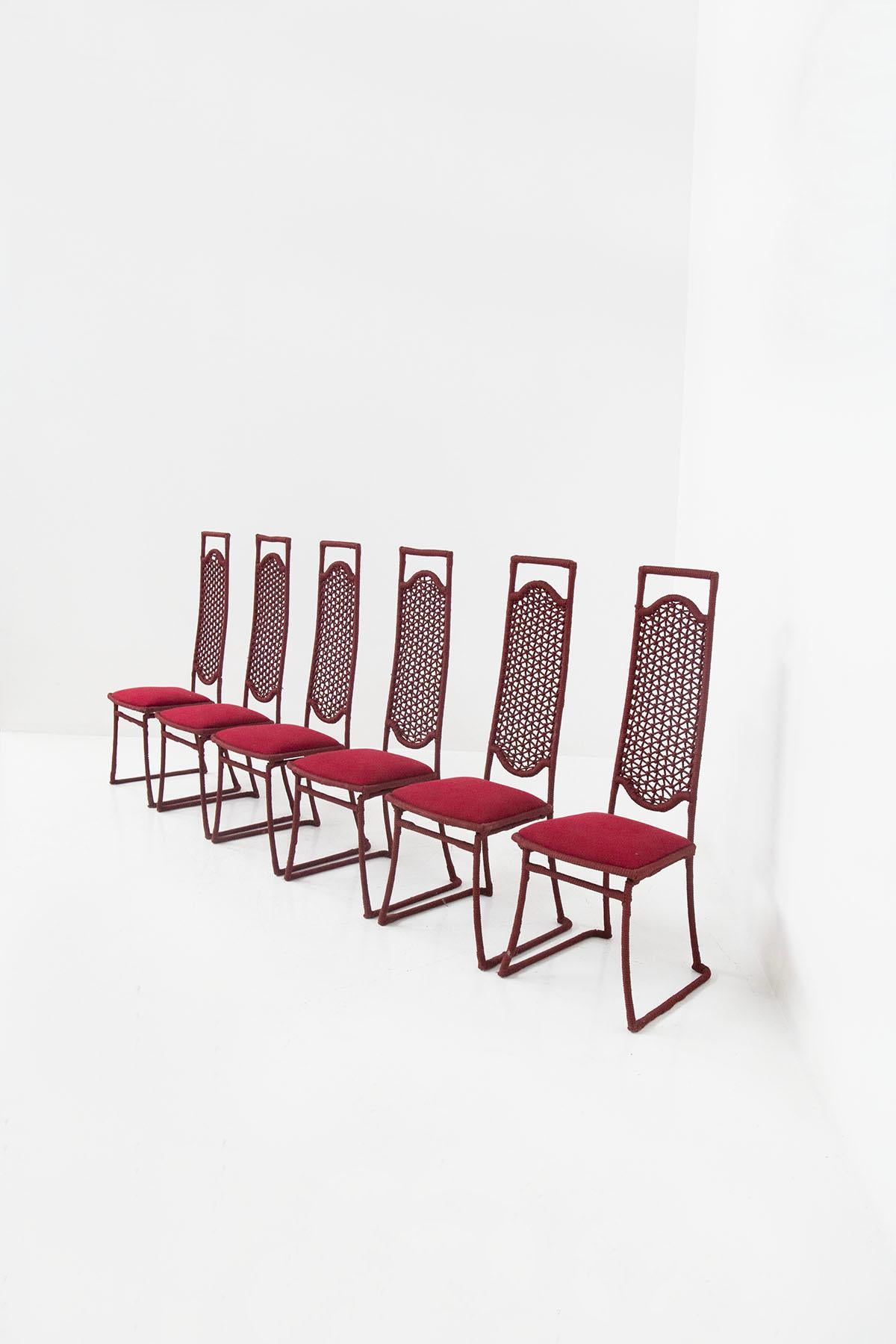 Beautiful set of six chairs by Marzio Cecchi from the Italian 1970s. The set was made for a hotel on Lake Garda. The set is in excellent condition. Made with an iron frame and wrapped in a thick net of red amaranth-colored rope. Its rectangular back