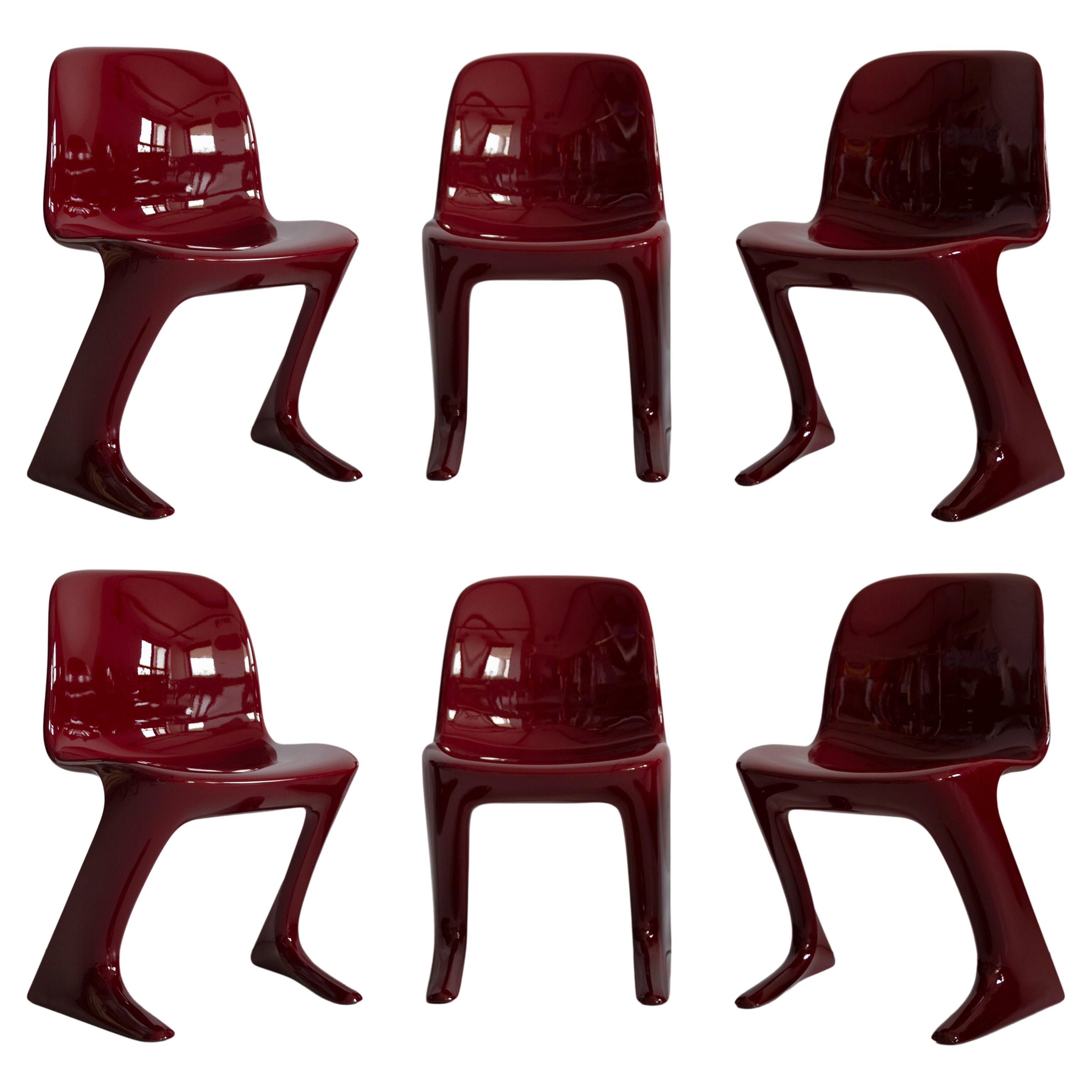 Set of Six Red Wine Kangaroo Chairs Designed by Ernst Moeckl, Germany, 1968 For Sale