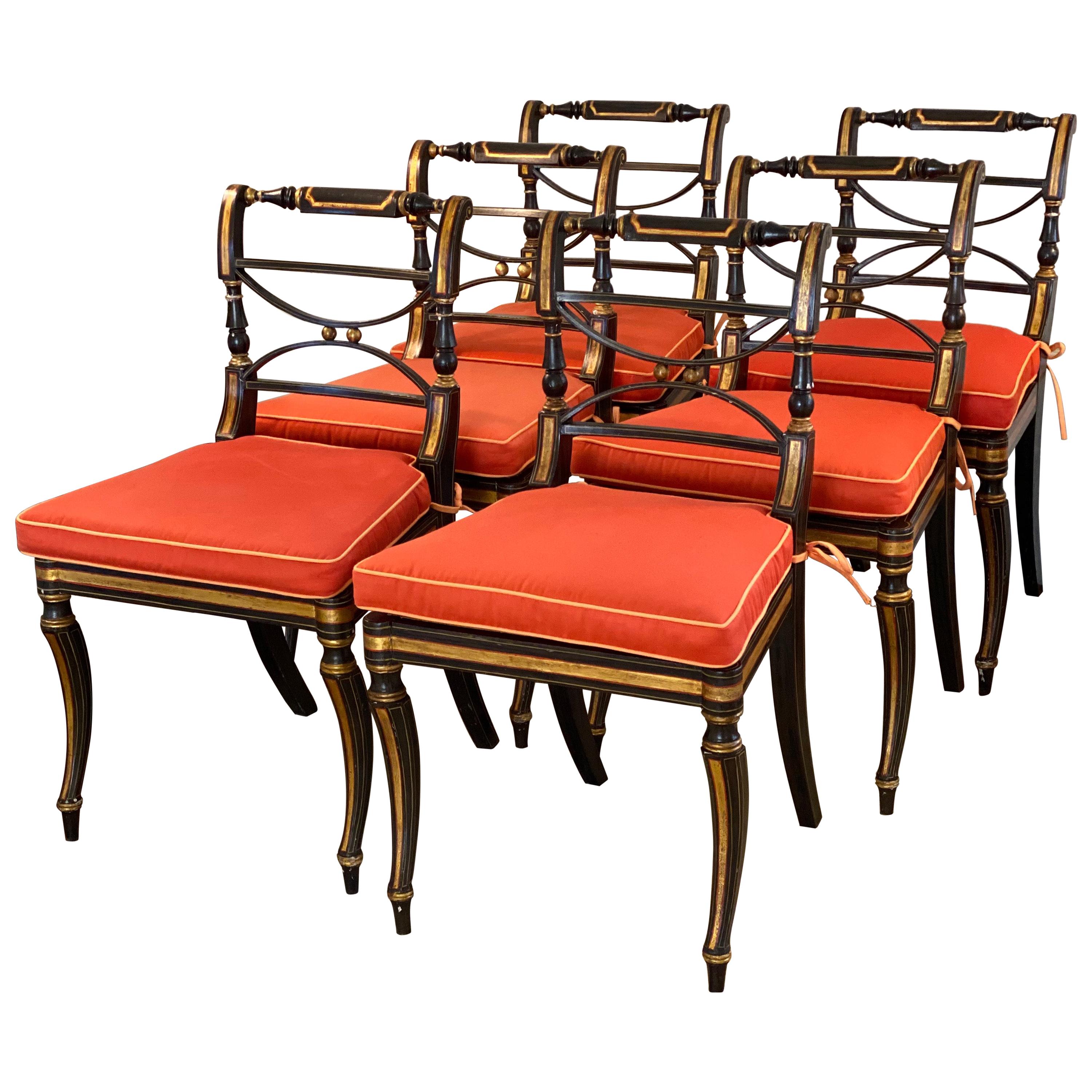 Satz von sechs teilweise vergoldeten Regency-Beistellstühlen aus Rosenholz mit Schilfrohr, um 1810 im Angebot