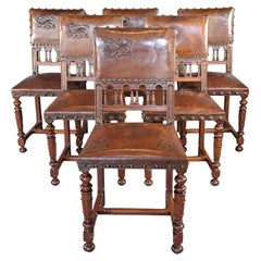 Ensemble de six chaises de style Upholstering recouvertes de cuir estampé d
un Salam