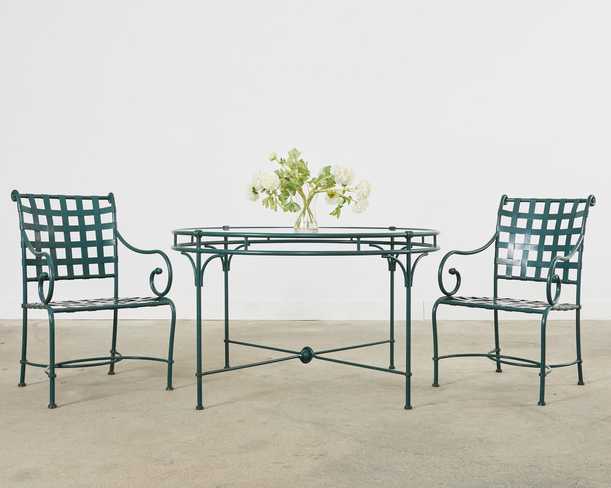 Rare set of six Florentine collection wrought aluminum patio and garden dining armchairs designed by Richard Frinier for Brown Jordan. The set features generous powder coated aluminum frames in a stately pompeian green finish. The backs have a