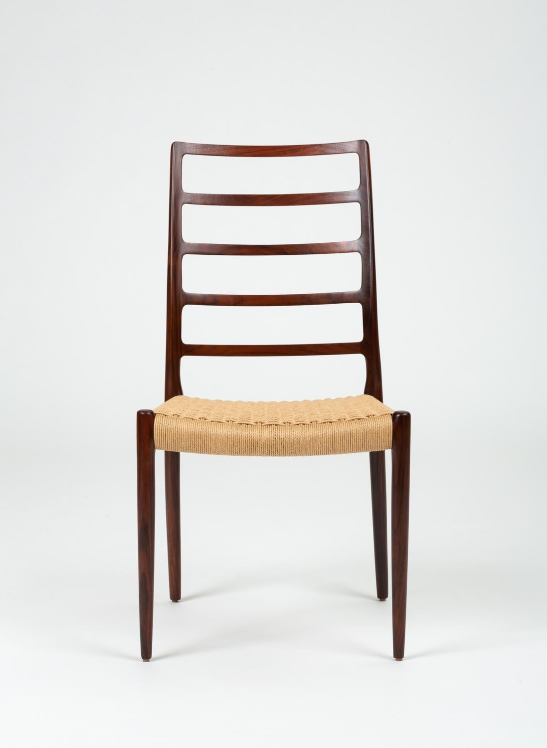 Scandinavian Modern Set of Six Rosewood and Danish Cord Møller Ladderback Model 82 Dining Chairs