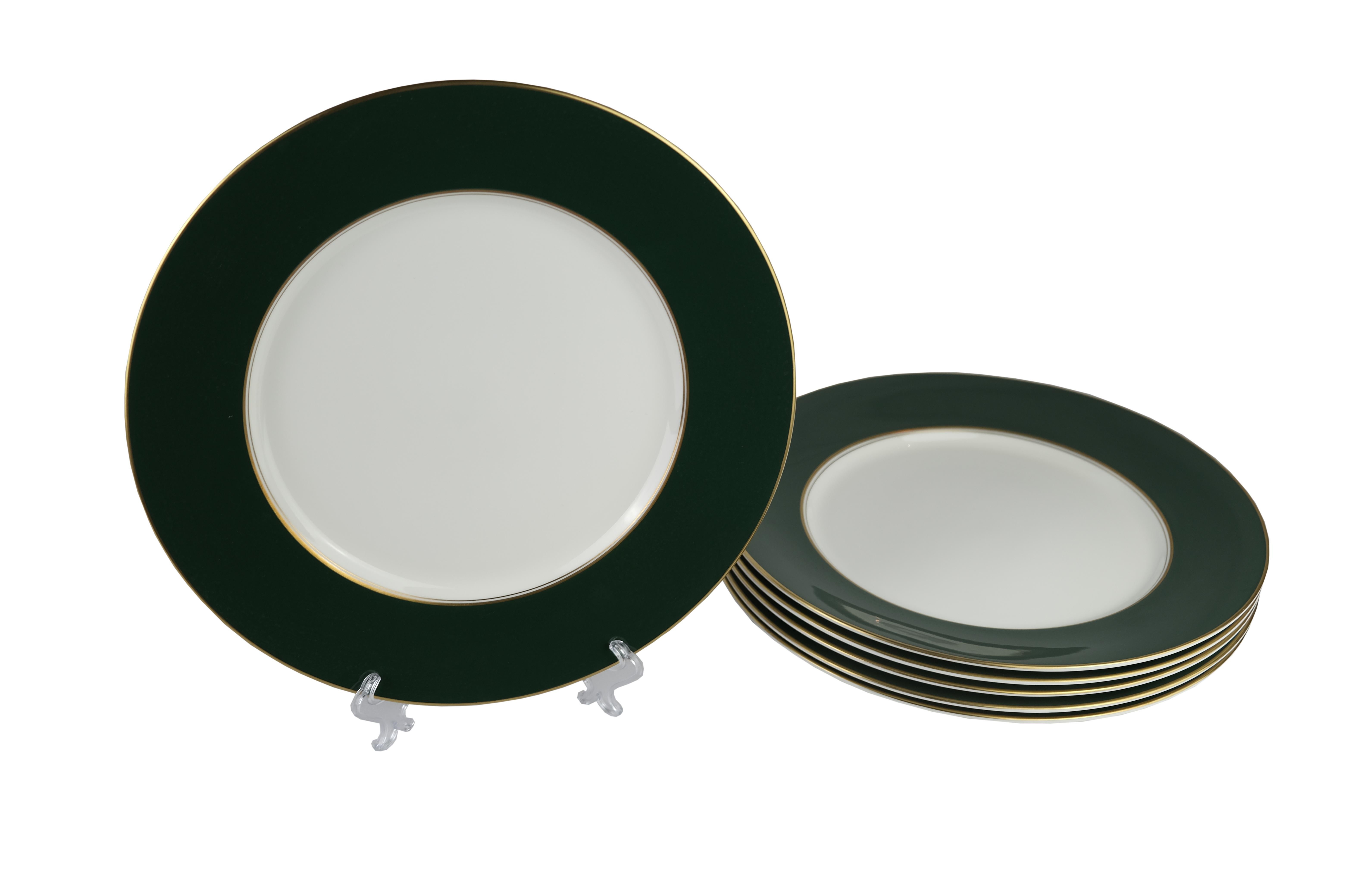 Set of six bone china forest green and gold rimmed chargers by Royal Worcester,
England.