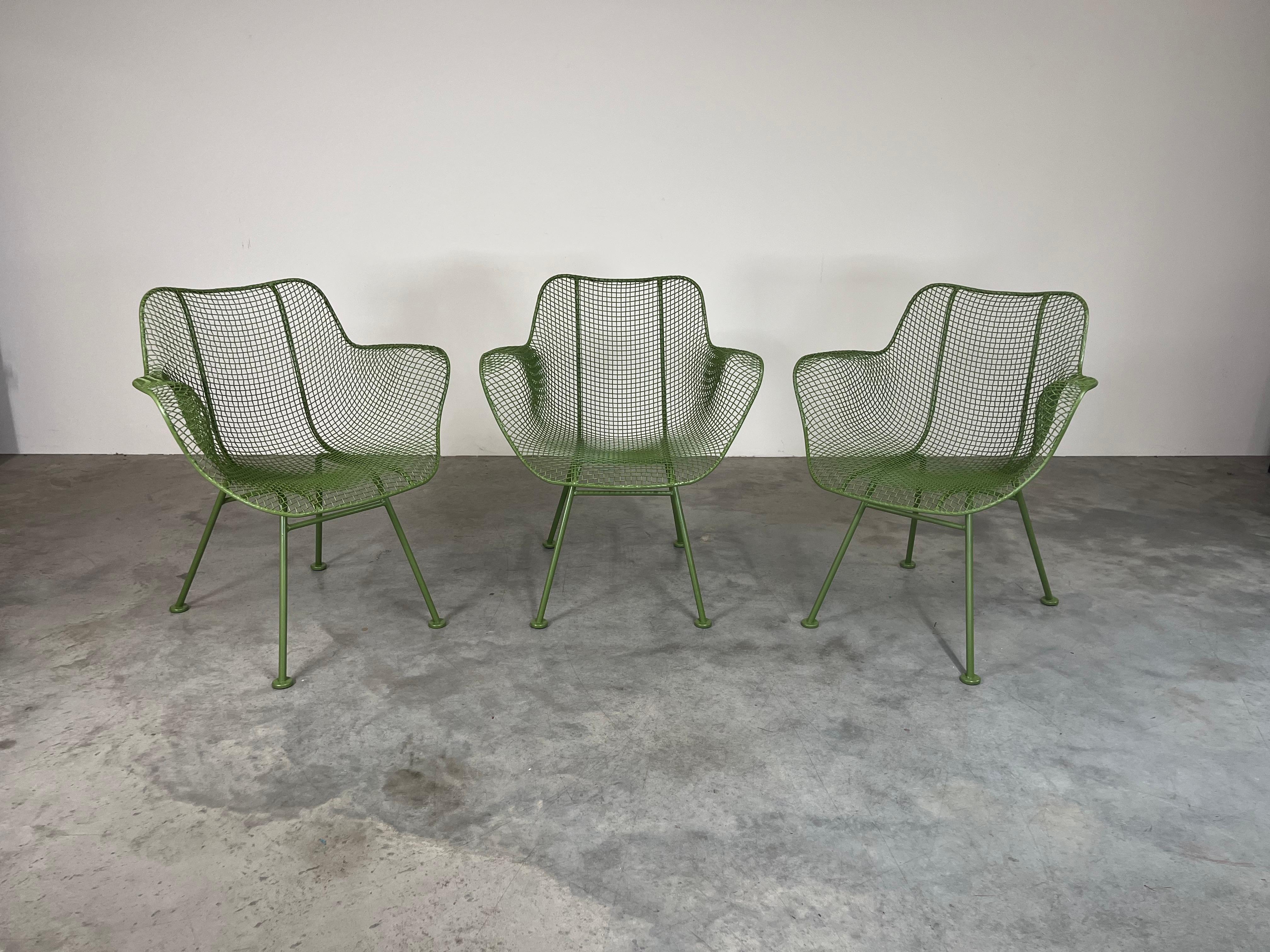 A beautiful set of 6 vintage Russell Woodard Sculptura patio armchairs in rare green. Very nice condition having no breaks or weakness. 2 of the chairs retain their original 