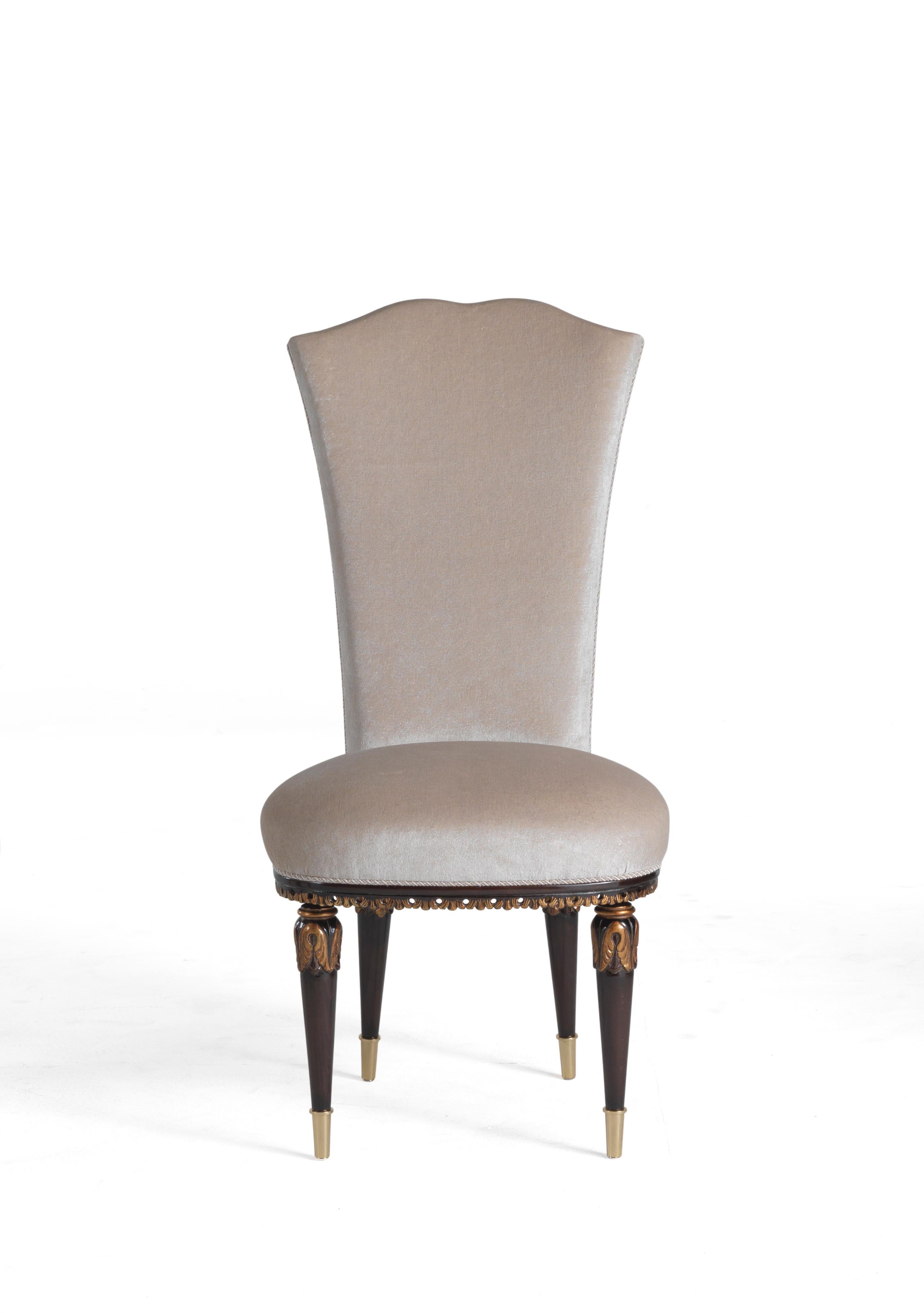Classy set of chairs that will enhance the elegance of any dining room. The set is composed by n.6 dining chairs and n.2 dining armchair in beige pearled velvet (3138/002), with hand carved legs, ebony painted and decorated with gold leaf and with