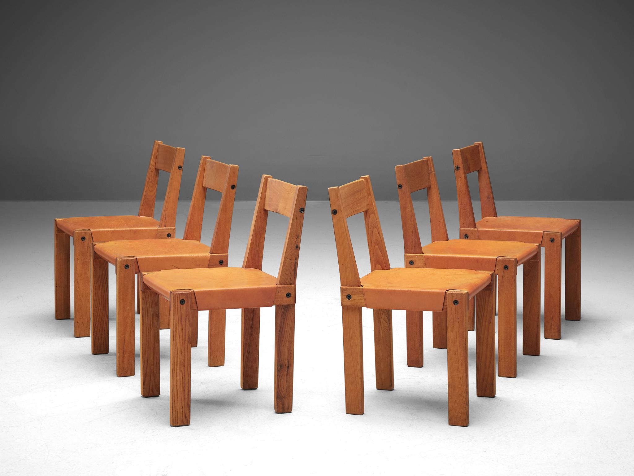 Pierre Chapo, set of six dining chairs, model S24, elm and leather, France, circa 1966.

A set of 6 chairs in solid elmwood with saddle leather seating and back. Designed by French designer Pierre Chapo in Paris. These chairs have a cubic design