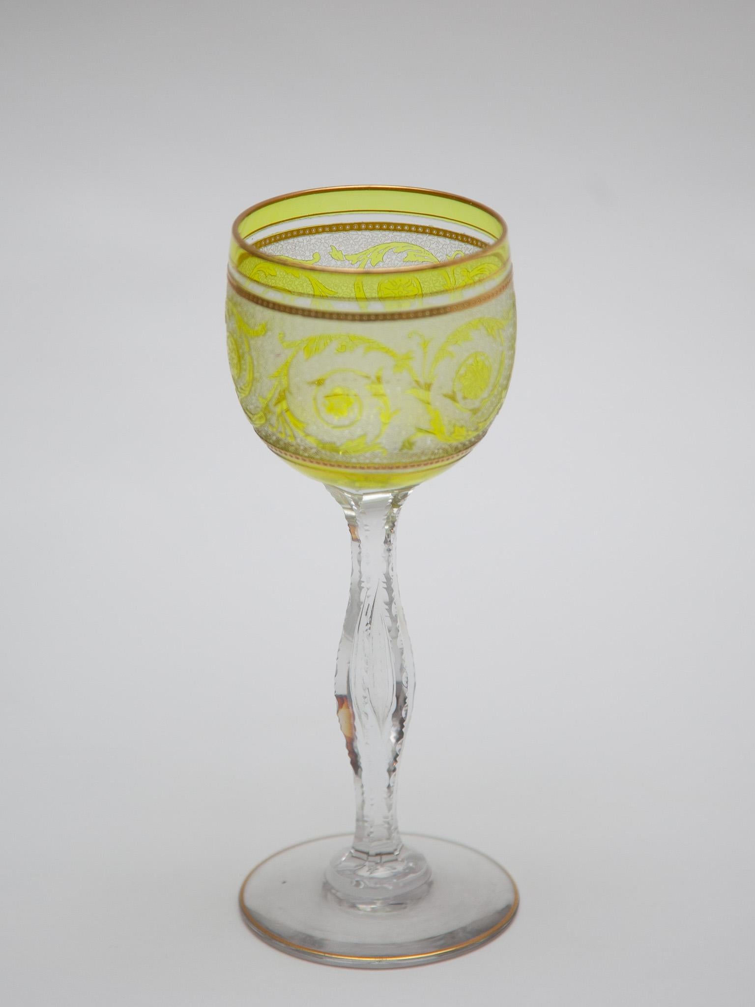 Very nice set French of six green wine-glasses made by Saint-Louis crystal date 1910 with a Thistle engraving and golden rings.The set glasses was created during the Art Nouveau movement in Europe and consists of mouth-blown, hand carved and