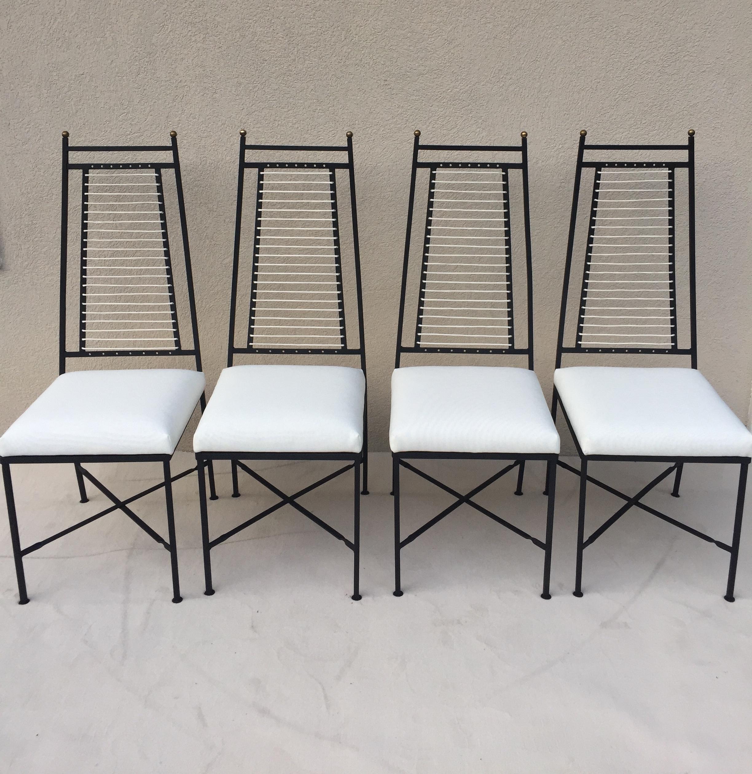 Salterini set 6 high back bronze top white cord back Iron chairs, cushioned foam seat off white woven fabric. Two arm chairs measurements are 42.50 high x 19.50 wide with arms x 17 deep. 4 side chairs measure 17' wide without arms. 18 seat height.