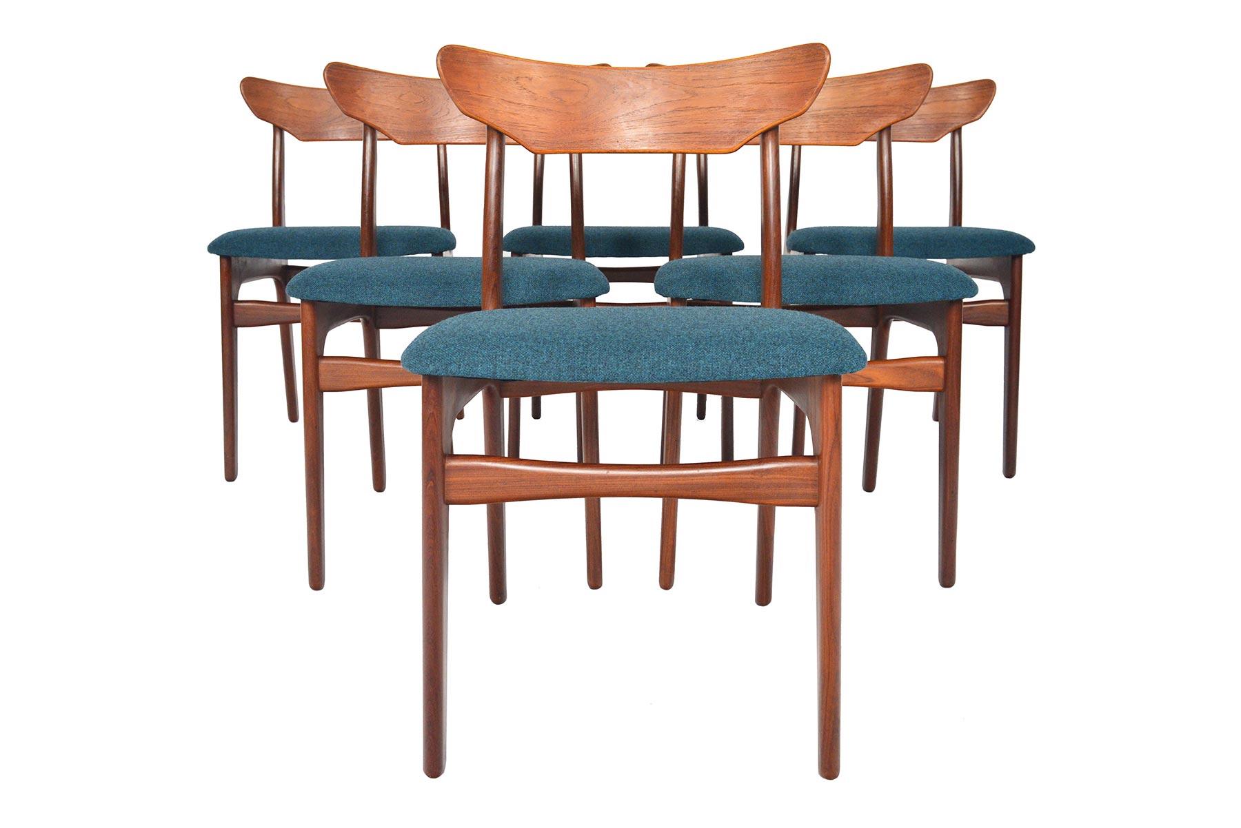 This set of six Danish modern midcentury dining chairs by Schionning & Elgaard offer a classic Scandinavian silhouette with a stately curved backrest. Crafted with teak backs and afrormosia frames, this set provides comfortable seating for both