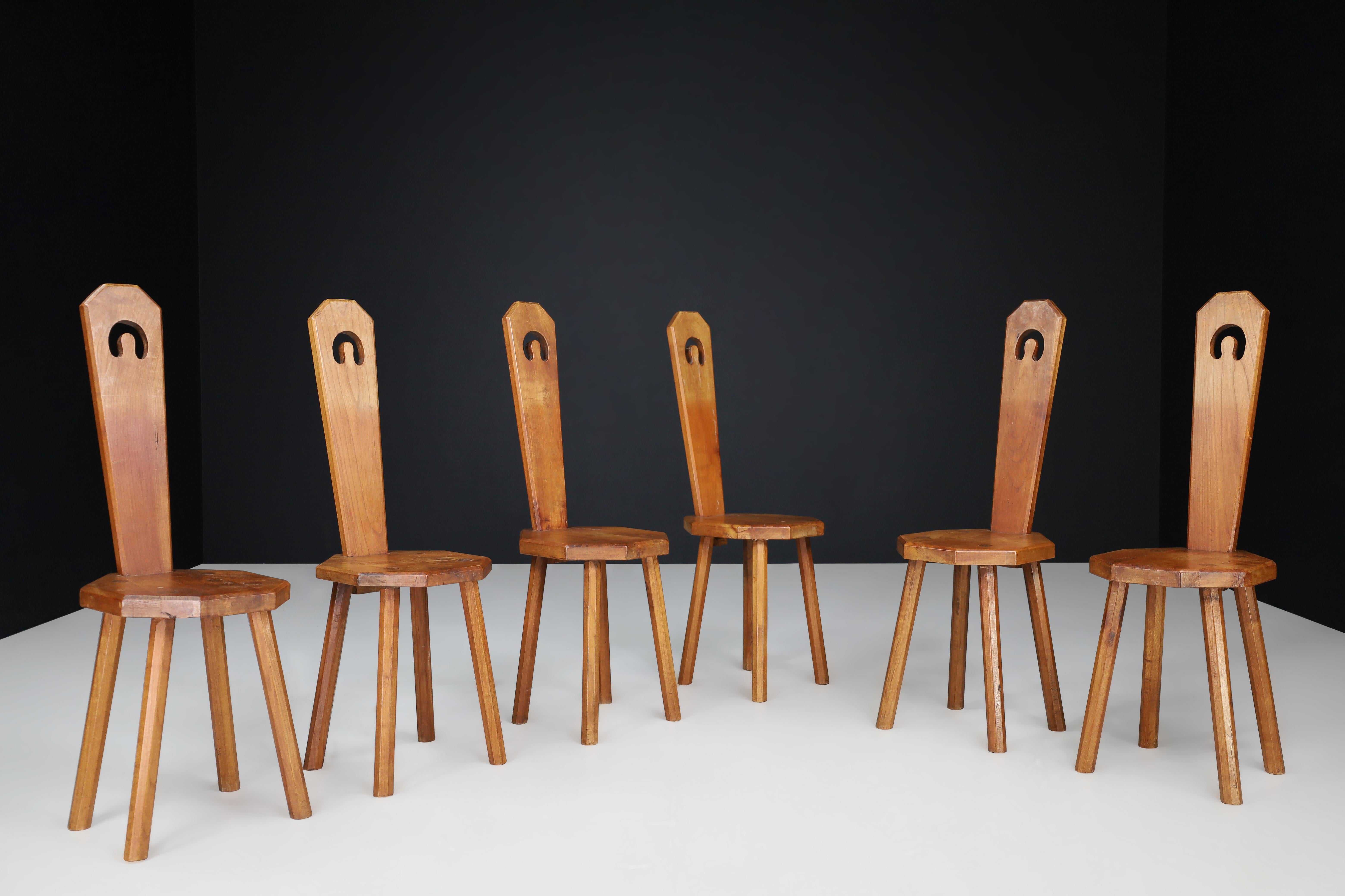 Set of Six Sculptural French Beechwood Chairs, 1950s
In the manner of Charlotte Perriand – Alpine Modernism

A striking set of six sculptural dining chairs, crafted in France during the 1950s. Made entirely from solid beechwood, these chairs embody