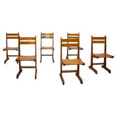 Satz von sechs skulpturalen Eichenstühlen