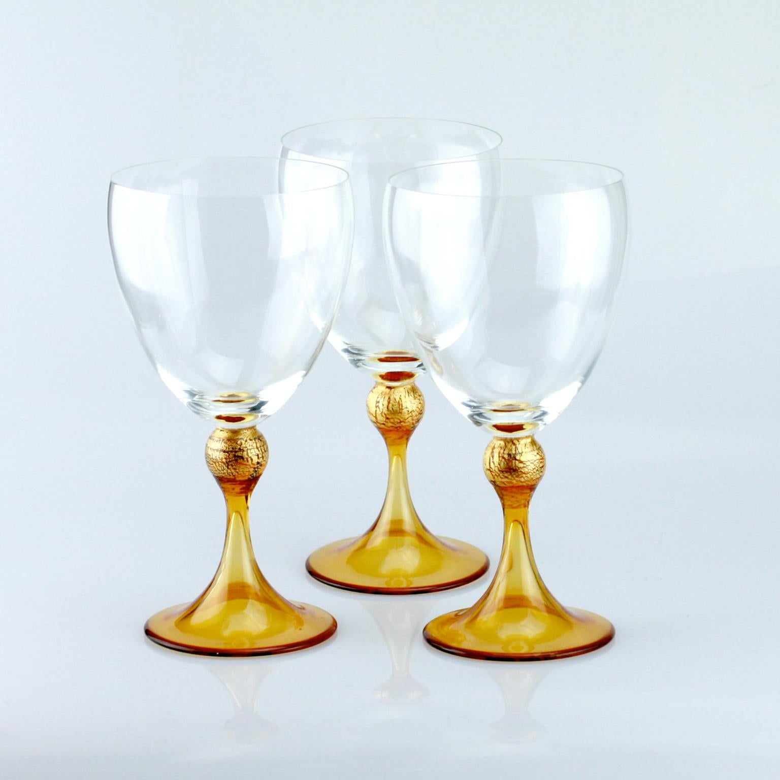 Set of six Seguso Murano glass goblets with amber steam.