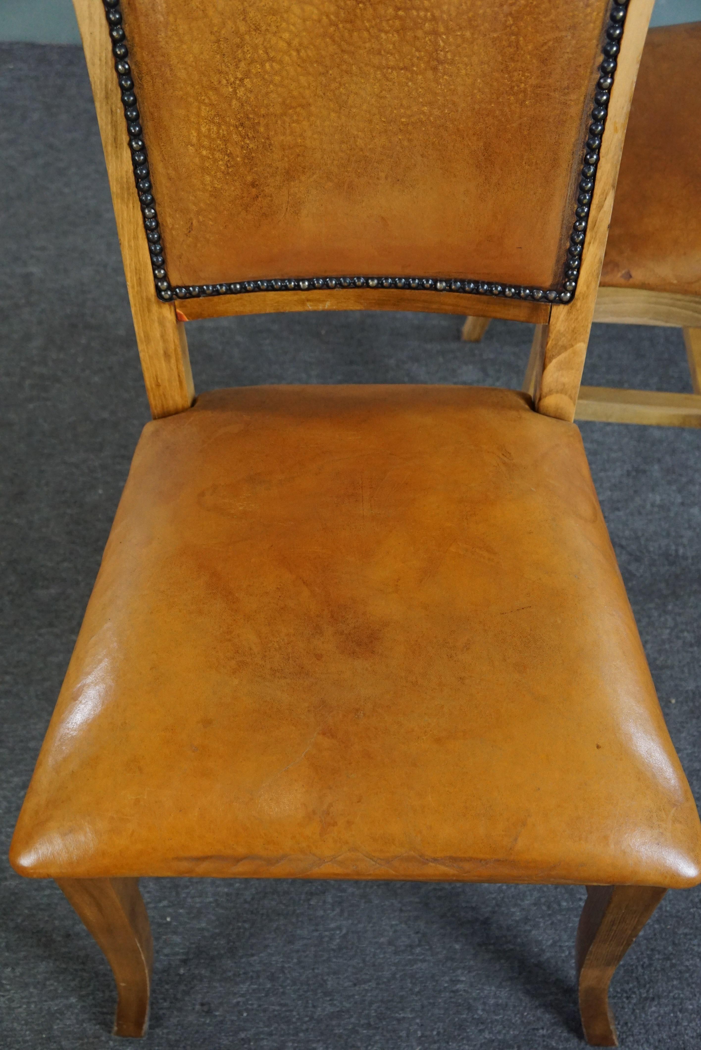 Set of six sheep leather dining chairs with a light wooden frame For Sale 5