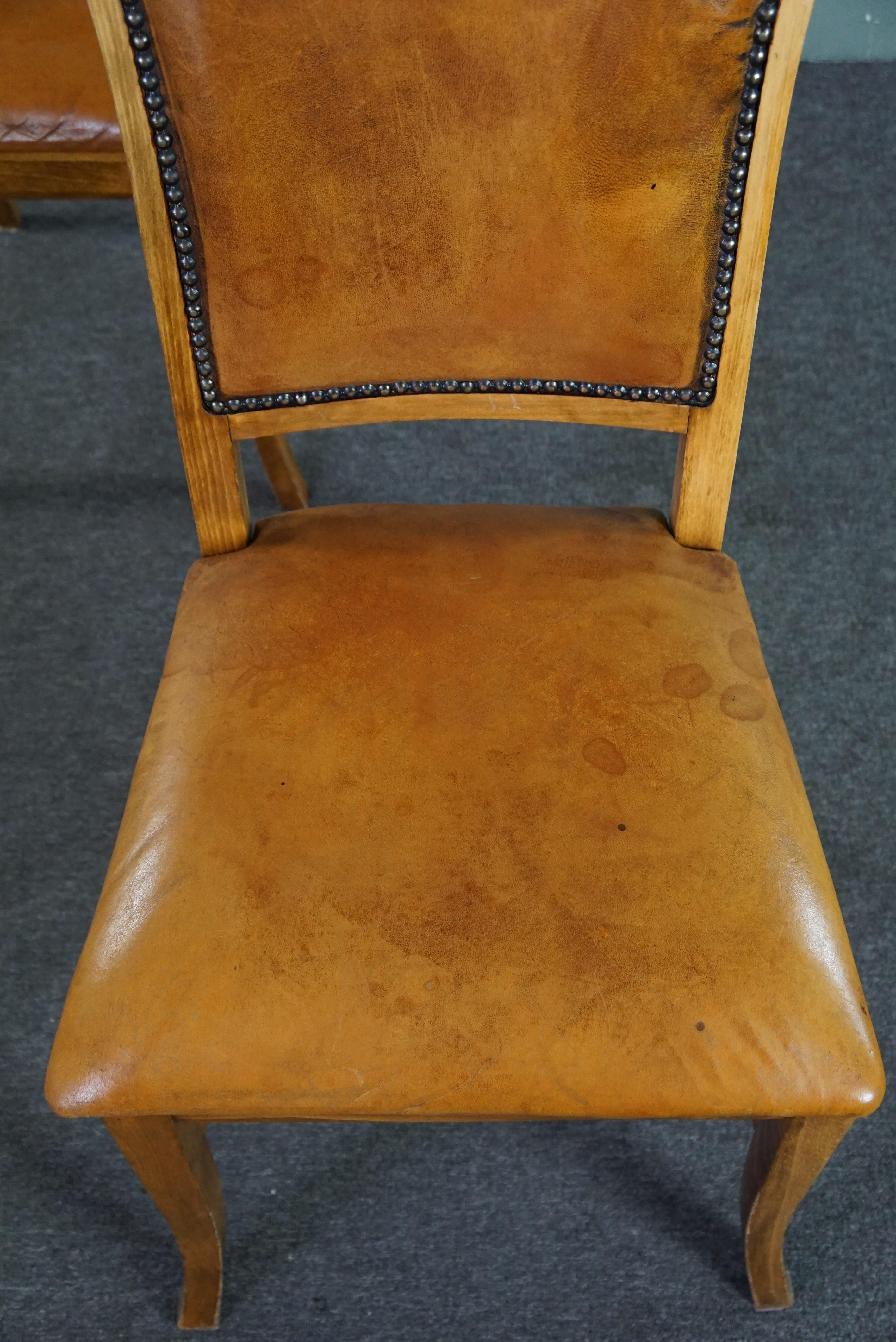 Set of six sheep leather dining chairs with a light wooden frame For Sale 4