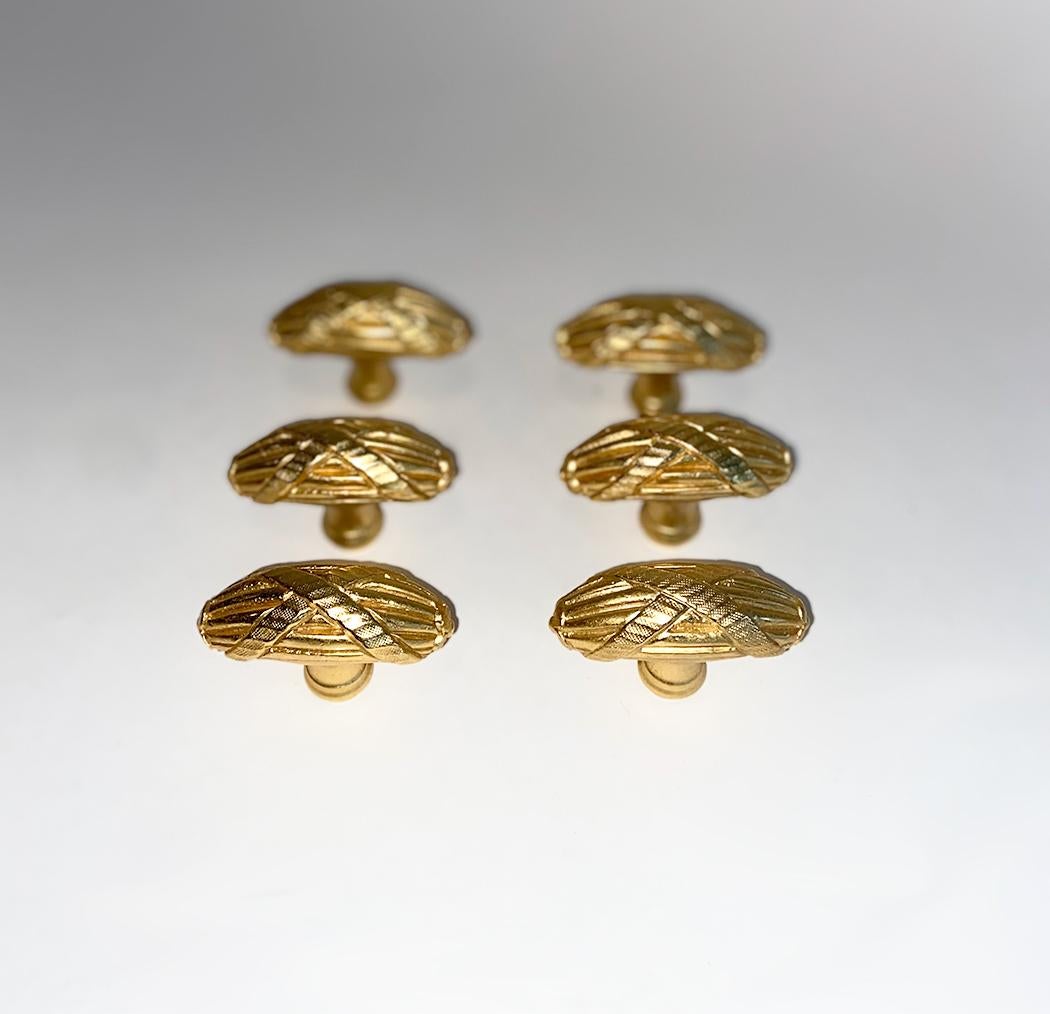 Set of six Sherle Wagner ribbon and reed cabinet drawer pulls in brass/bronze gold finish. Like new condition. Price is for the set of six. Sherle Wagner International.