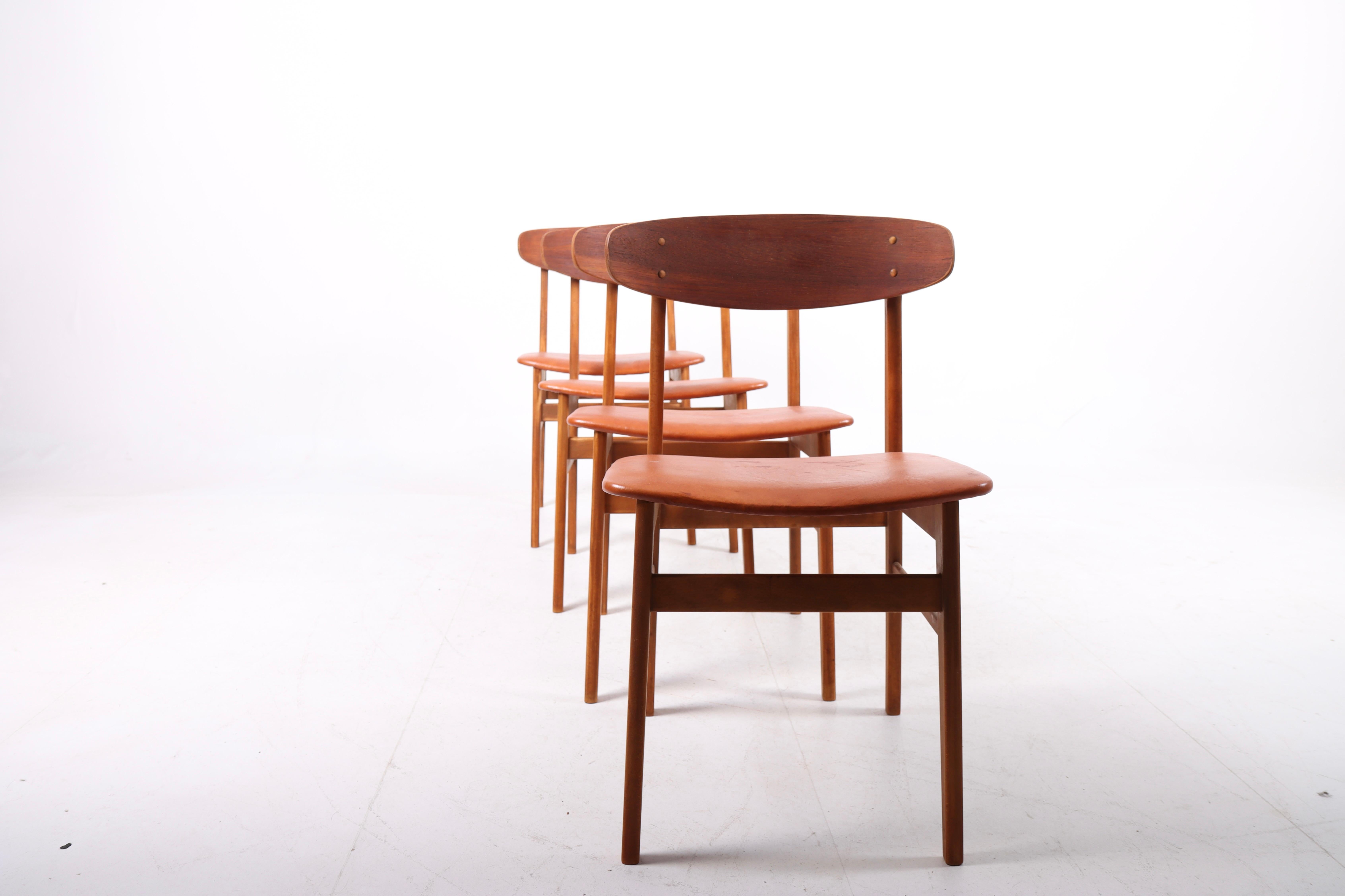 Set of six side chairs in teak and patinated leather. Designed and made by Fartrup. Great condition, 1960s.