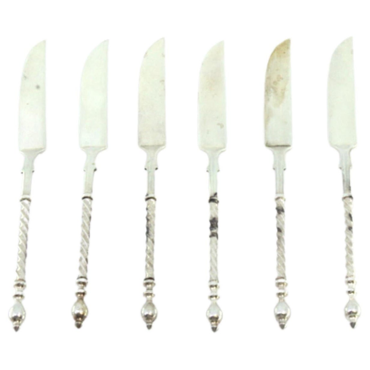Set of six silver butter knives