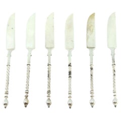 Set of six silver butter knives