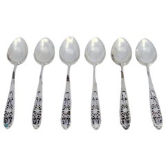Set of six silver coffee spoons with filigree-cut handles