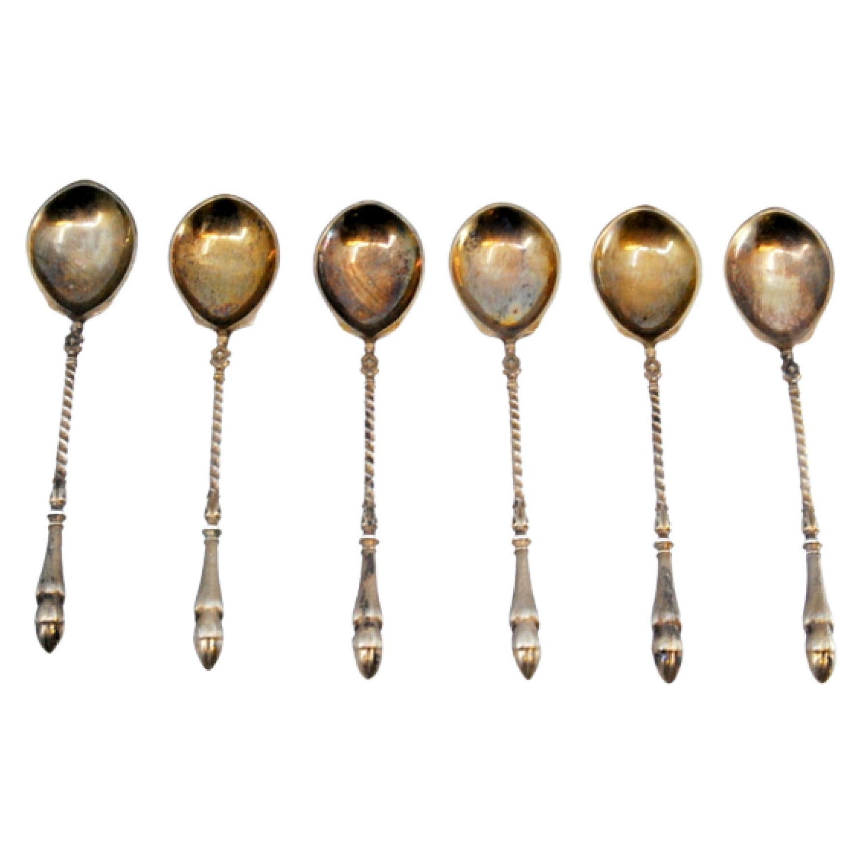 Set of six silver-gilt teaspoons with twisted crowbar-shaped handles
