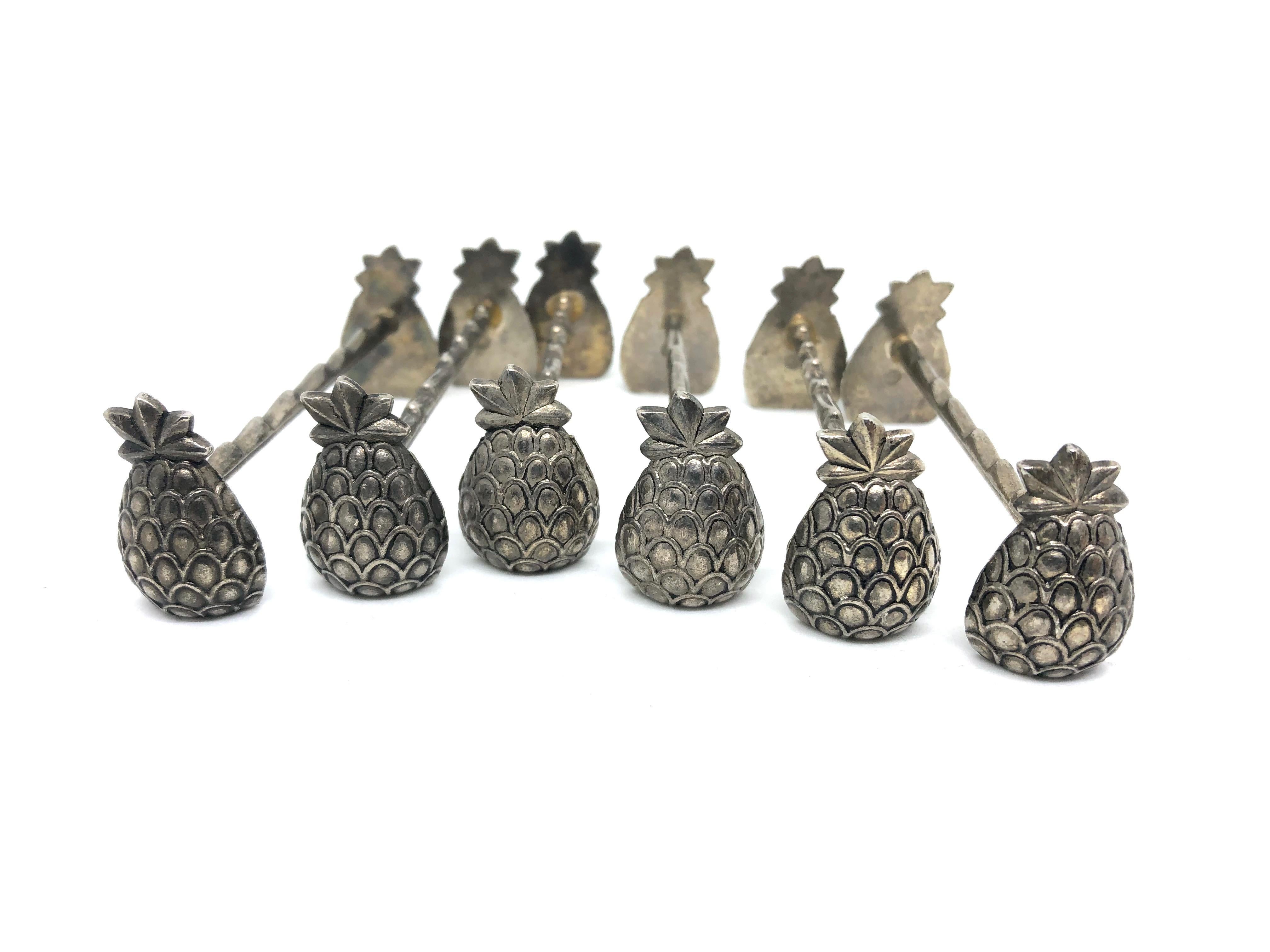 A set of six silver plated figural flatware knife rests in the form of pineapples, circa 1950s, European. Nice addition to every table or hunting lodge. Little bid tarnished, but this is old-age.
 