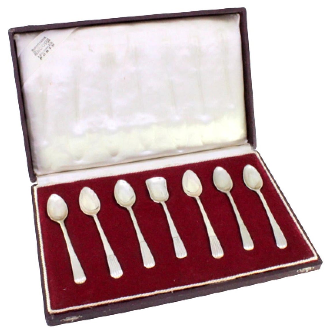 Set of six silver teaspoons and sugar scoops with reed-style handles