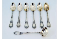 Set of six silver teaspoons and sugar shovels with monogram cards