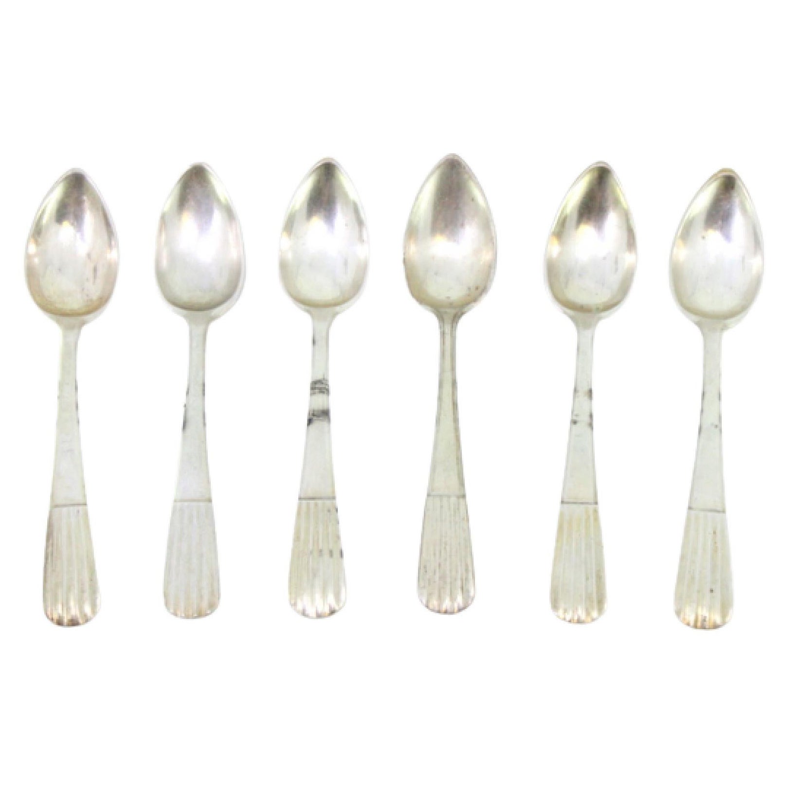 Set of six silver teaspoons with embossed handles in the style of reeds