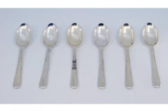 Set of six silver teaspoons with engraved handles