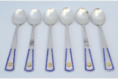 Set of six silver teaspoons with golden flowers & blue-edged handles