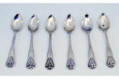 Set di sei cucchiaini d'argento con palme in rilievo sui manici