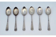 Set of six silver teaspoons with palms on the shells and engraved handles