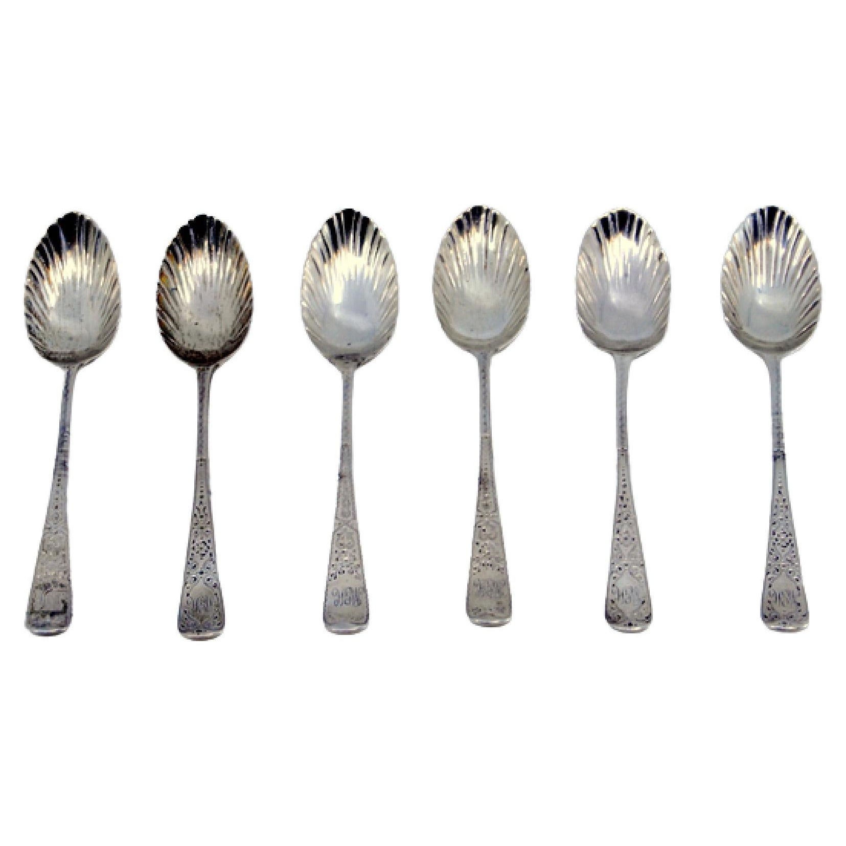 Set of six silver teaspoons with palms on the shells and engraved handles