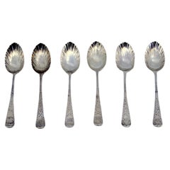 Set of six silver teaspoons with palms on the shells and engraved handles