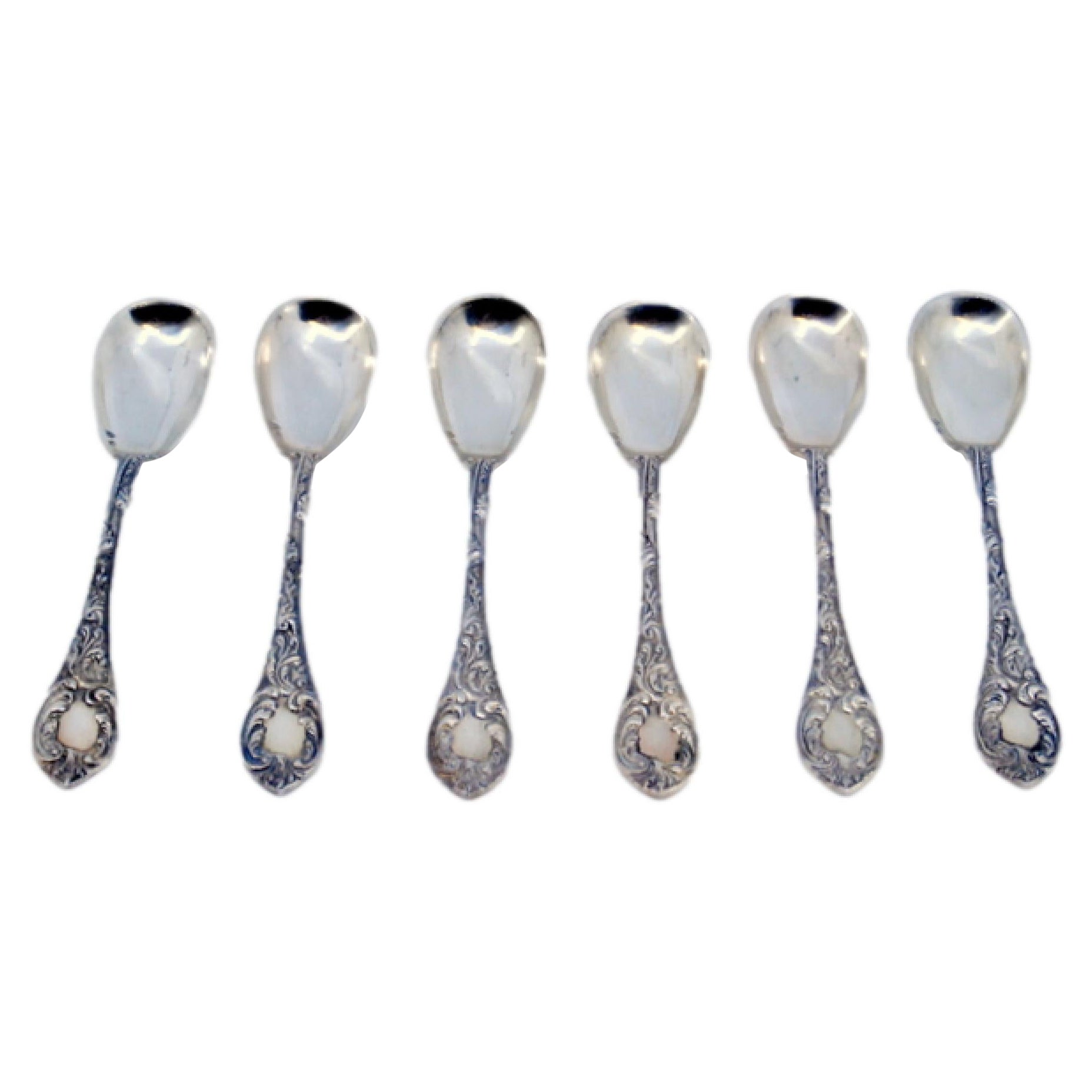 Set of six silver teaspoons with raised handles