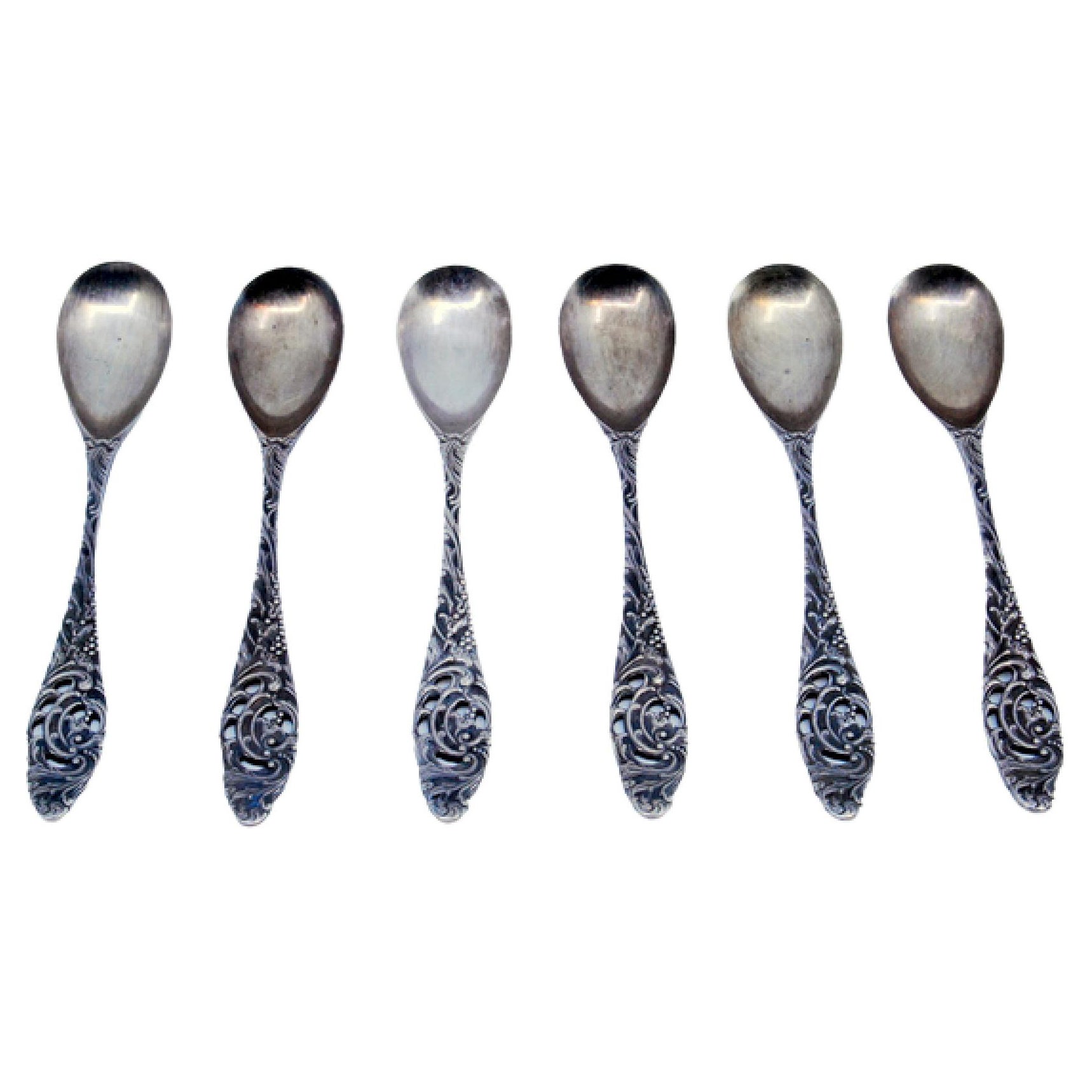 Set of six silver teaspoons with reliefs and cut-out handles