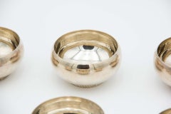 Set of six silver washbasins with beads