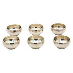 Set of six silver washbasins with beads