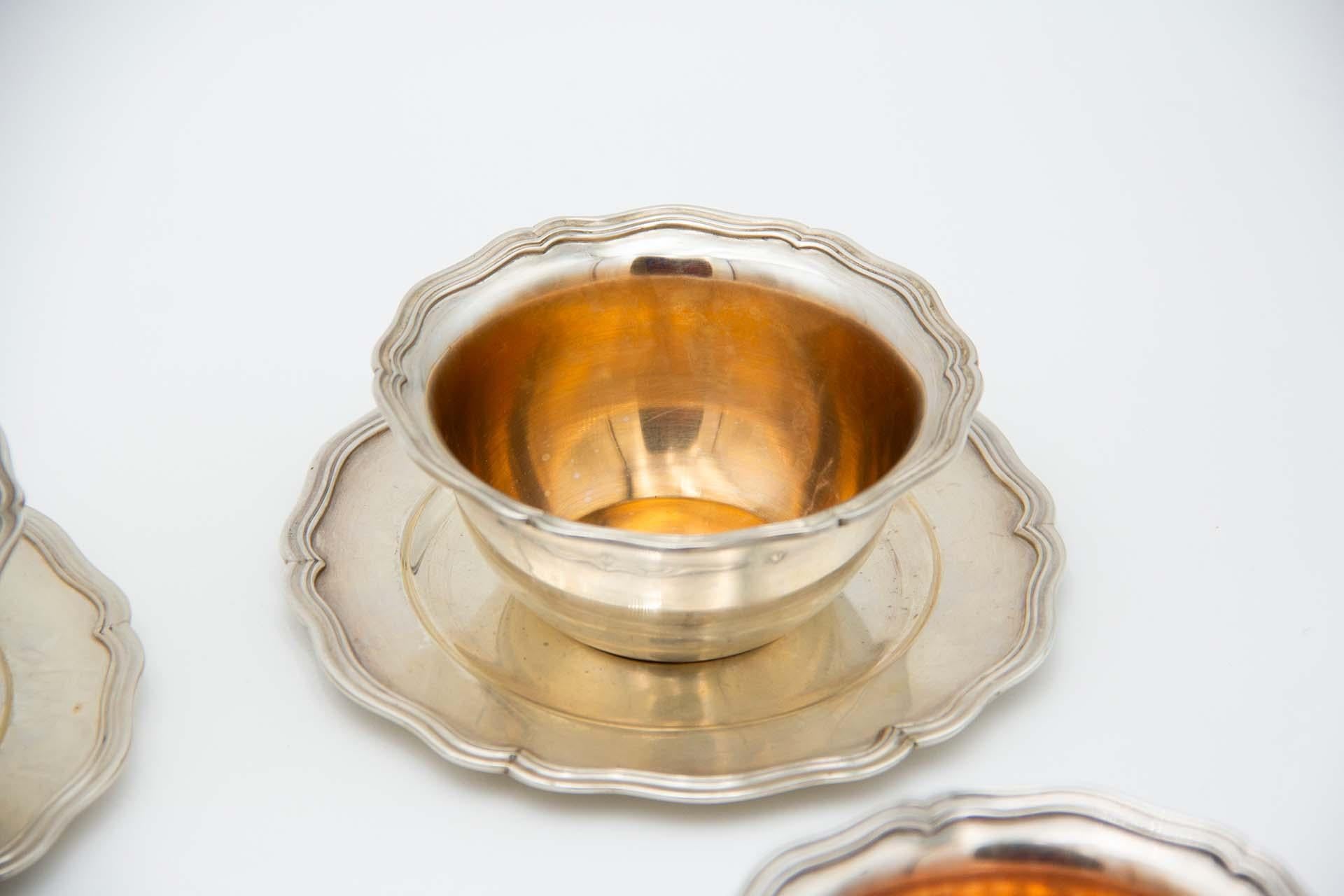 Description: Set of six silver washbasins with beaded plates on the edges. Metal: Silver. Origin: Portuguese. Mark: standing eagle - I Title. Weight: 1512.92 grams. Dimensions: Saucer 14.8cmx0.9cm  . Content: 916/1000. Assay Mark: Yes, between 1938