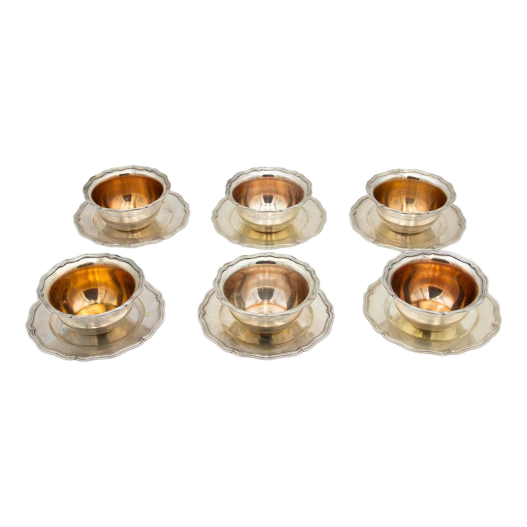 Set of six silver washbasins with dishes